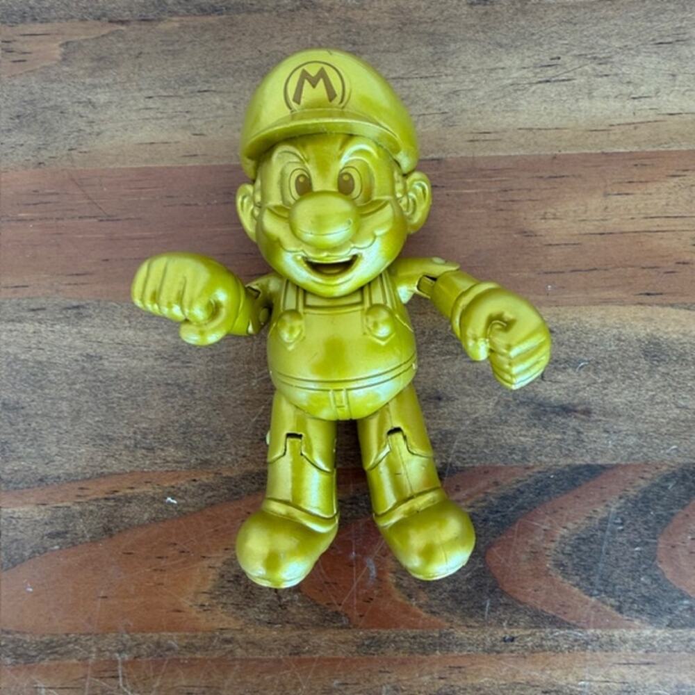 World Of Nintendo 4 Inch Gold Mario Pose-able Action Figure